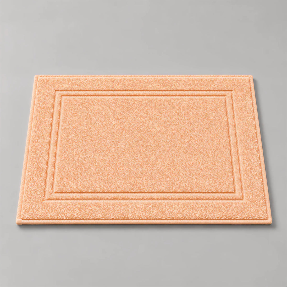 Badvorleger Apricot aus Walkfrottee, 50 x 70 cm, gefaltet auf hellgrauem Hintergrund