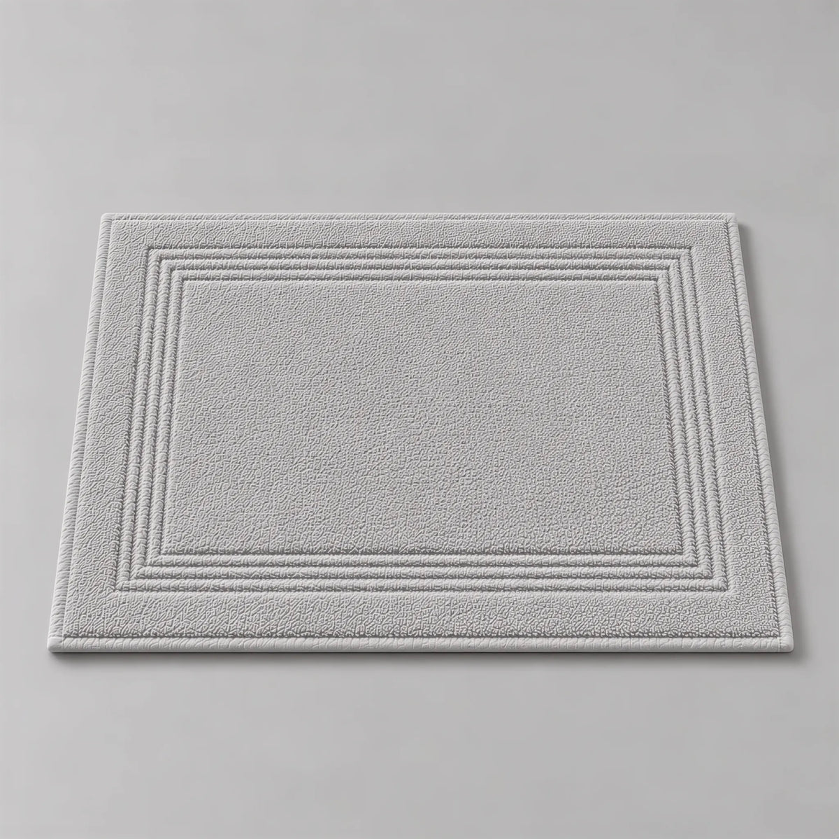 Badematte grau aus Zwirnfrottee, 50 x 70 cm, flach liegend auf hellgrauem Hintergrund
