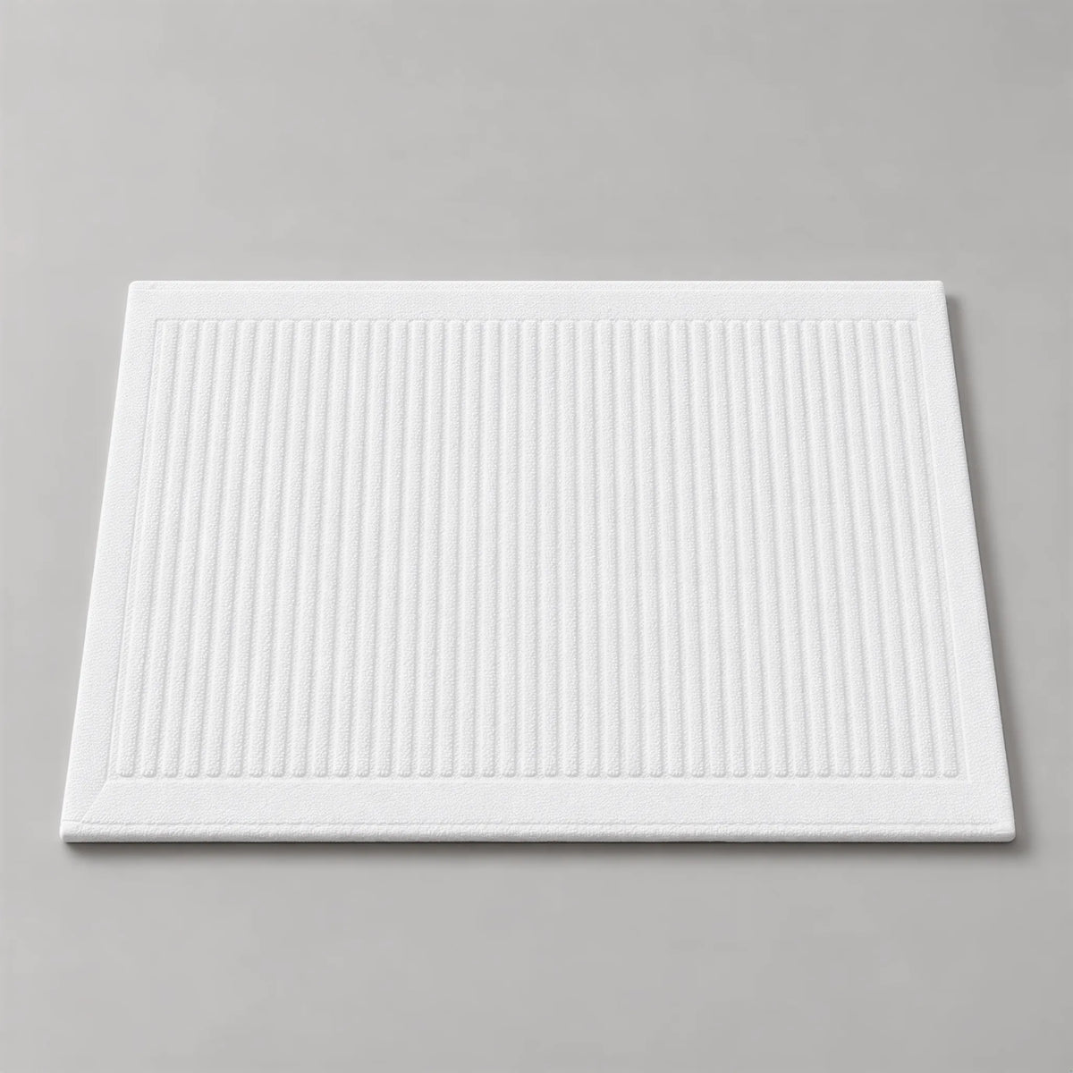 Badematte weiß aus Zwirnfrottee, 50 x 70 cm, flach liegend auf hellgrauem Hintergrund