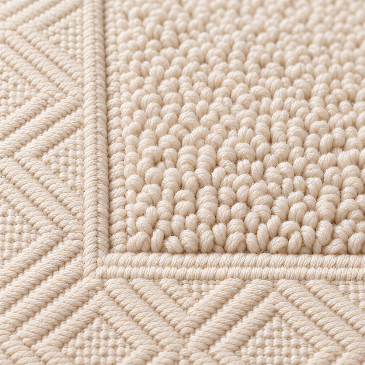 Nahaufnahme der Frottee-Schlingen – Badematte creme beige