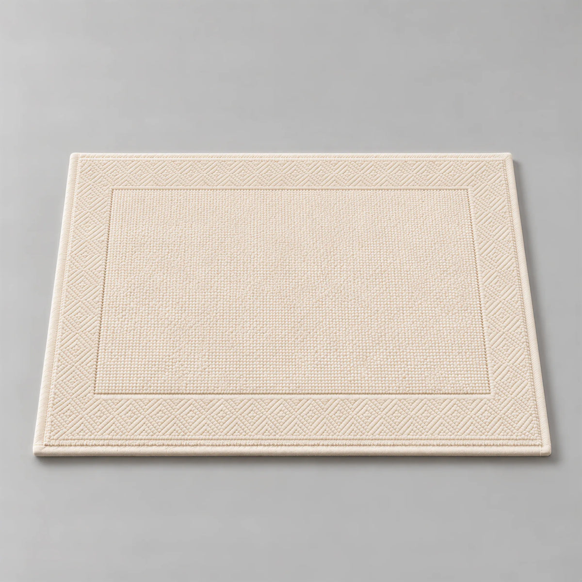 Badematte creme beige aus Zwirnfrottee, 50 x 70 cm, gefaltet auf hellgrauem Hintergrund