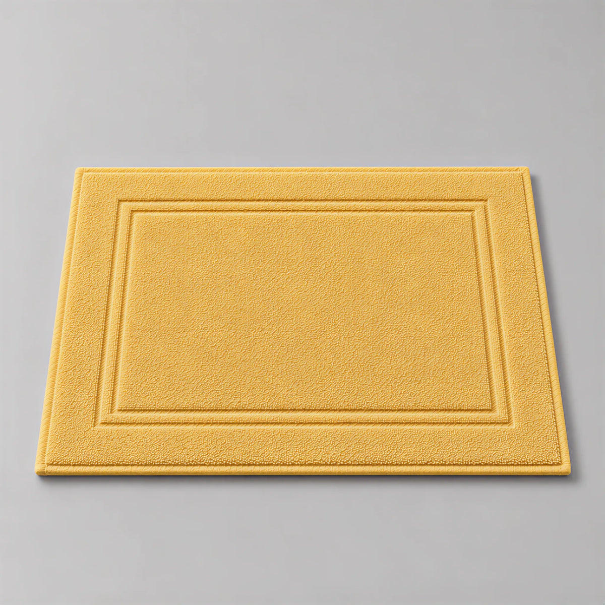 Badvorleger Gold aus Walkfrottee, 50 x 70 cm, gefaltet auf hellgrauem Hintergrund
