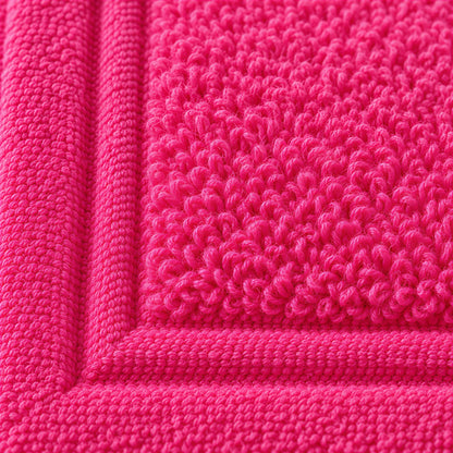 Nahaufnahme der weichen Frottee-Schlingen – Badvorleger Pink