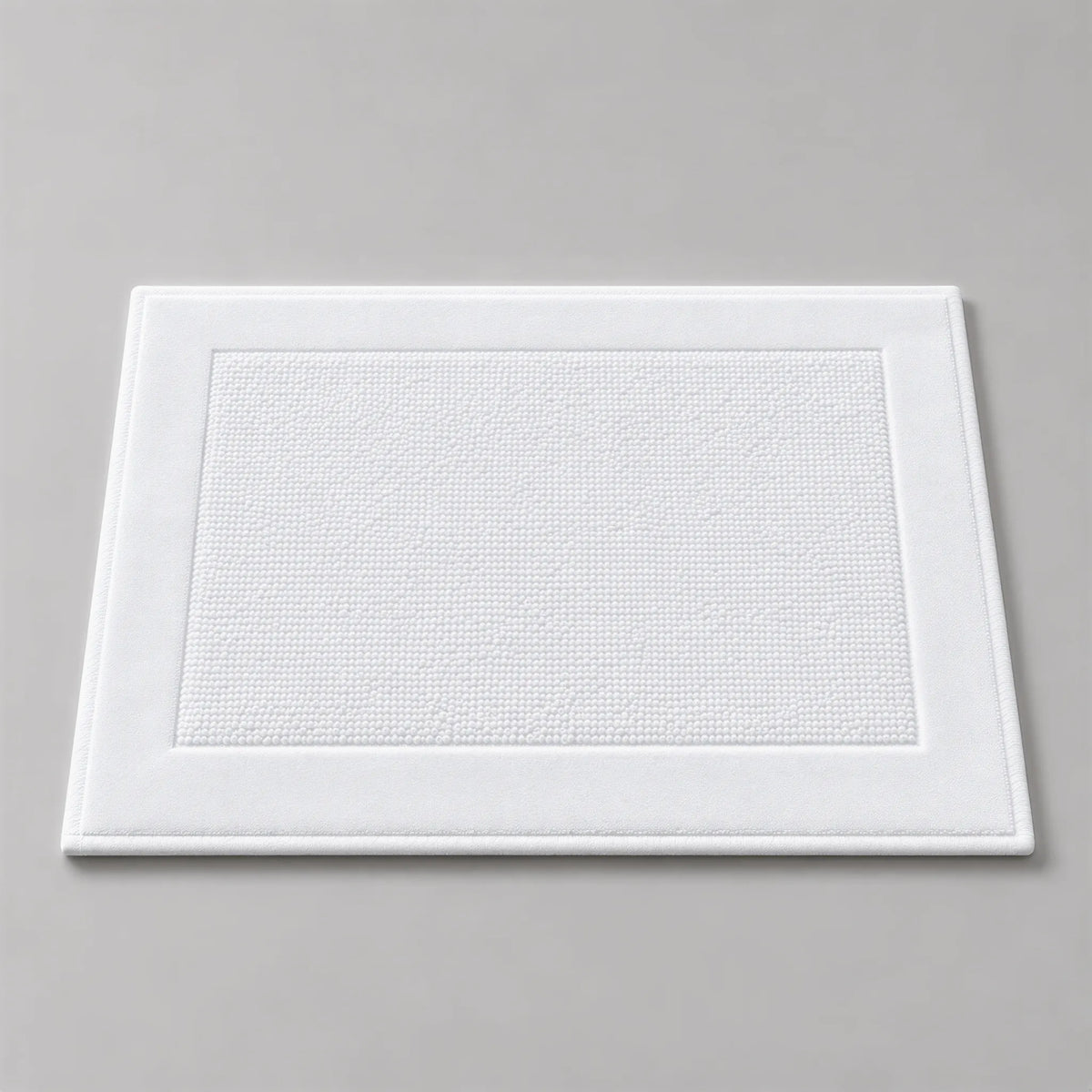 Badematte weiß aus Zwirnfrottee, 50 x 70 cm, flach liegend auf hellgrauem Hintergrund