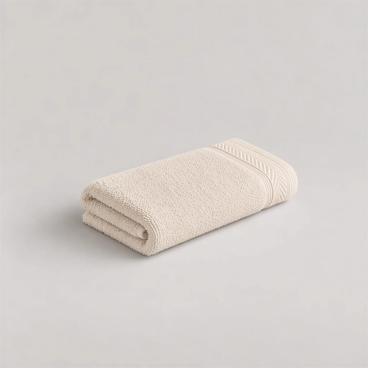 Gästetuch Creme-Beige aus Walkfrottee, 30 x 50 cm, gefaltet auf hellgrauem Hintergrund