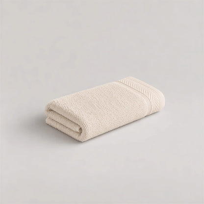 Gästetuch Creme-Beige aus Walkfrottee, 30 x 50 cm, gefaltet auf hellgrauem Hintergrund