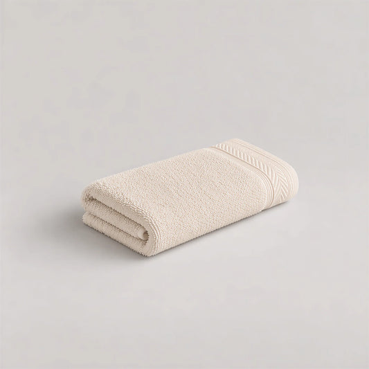 Gästetuch Creme-Beige aus Walkfrottee, 30 x 50 cm, gefaltet auf hellgrauem Hintergrund