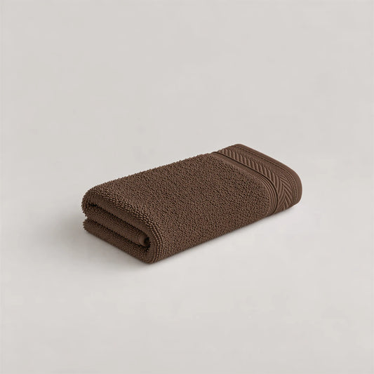 Gästetuch Mocca aus Walkfrottee, 30 x 50 cm, gefaltet auf hellgrauem Hintergrund