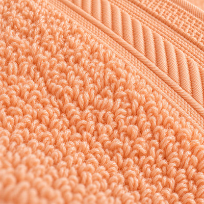 Nahaufnahme der weichen Frottee-Schlingen und der Bordüre – Handtuch Apricot