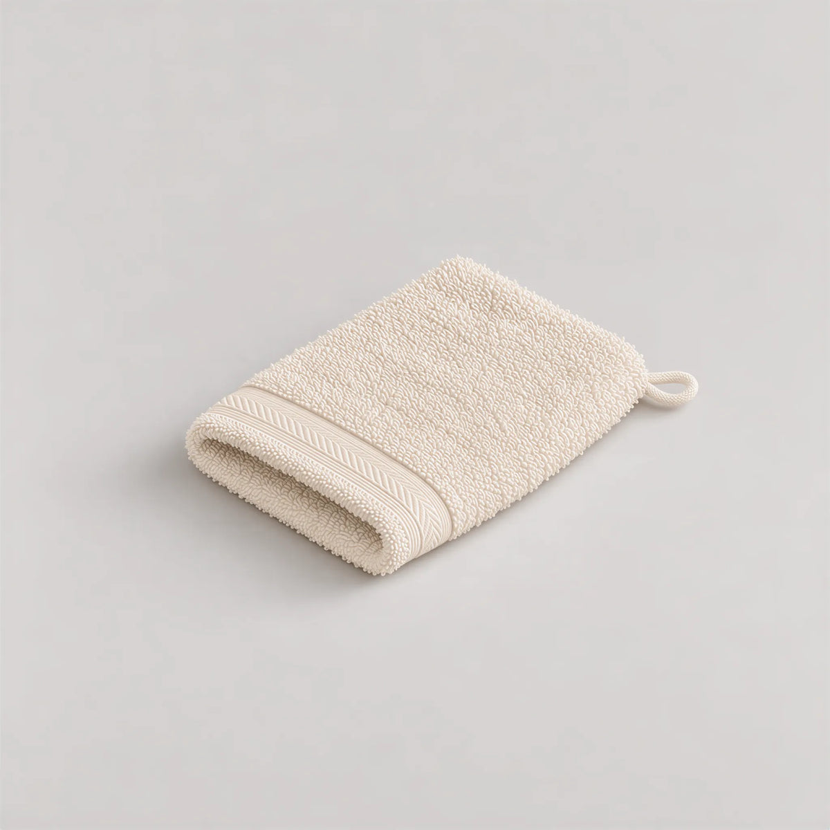 Waschhandschuh Creme-Beige aus Walkfrottee, 15 x 20 cm, gefaltet auf hellgrauem Hintergrund