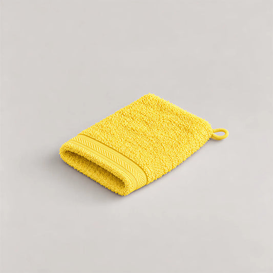 Waschhandschuh Gelb aus Walkfrottee, 15 x 20 cm, gefaltet auf hellgrauem Hintergrund