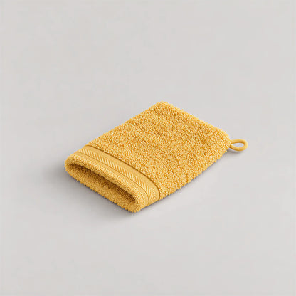 Waschhandschuh Gold aus Walkfrottee, 15 x 20 cm, gefaltet auf hellgrauem Hintergrund