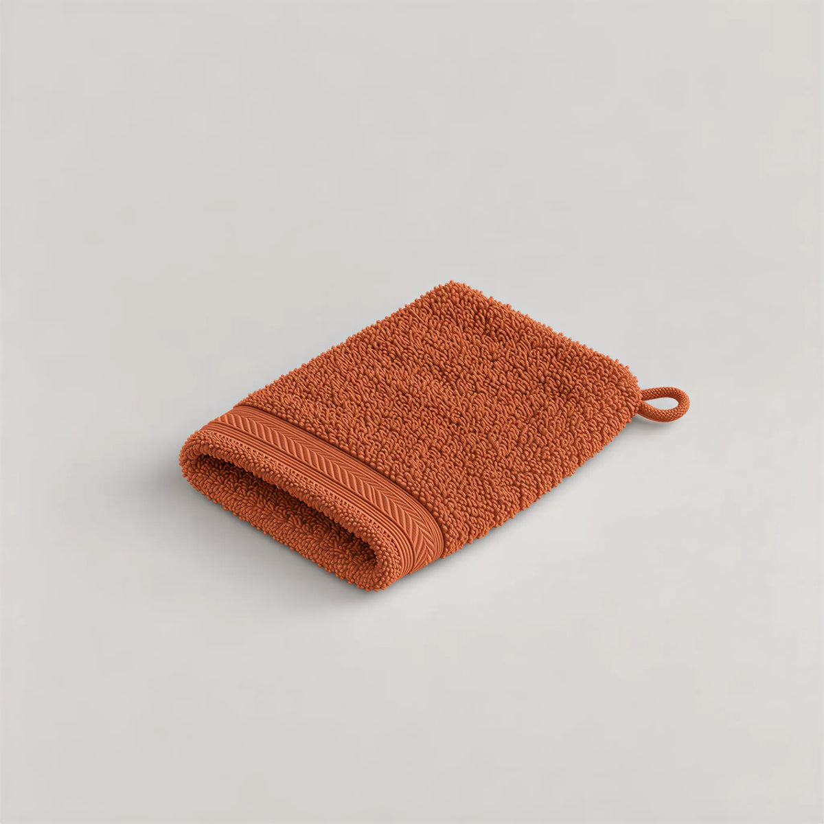 Waschhandschuh Terracotta aus Walkfrottee, 15 x 20 cm, gefaltet auf hellgrauem Hintergrund